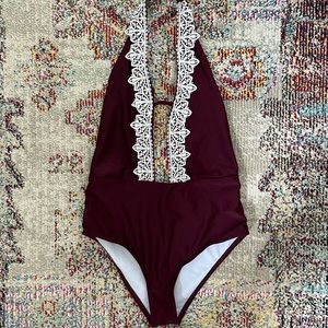 NWOT plunging halter one piece